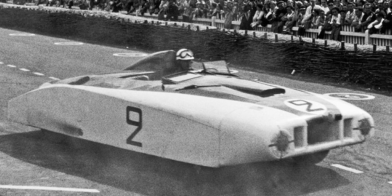 The Cadillac Le Monstre Racecar Speeding Down a Track