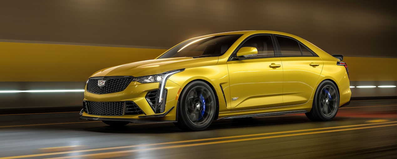 A Front Angled View of a Yellow CT4-V Blackwing Driving Through a Tunnel