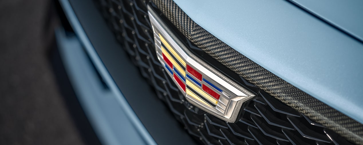 Close-up of the Cadillac Logo on the Front Grille of a Cadillac V-Series Vehicle