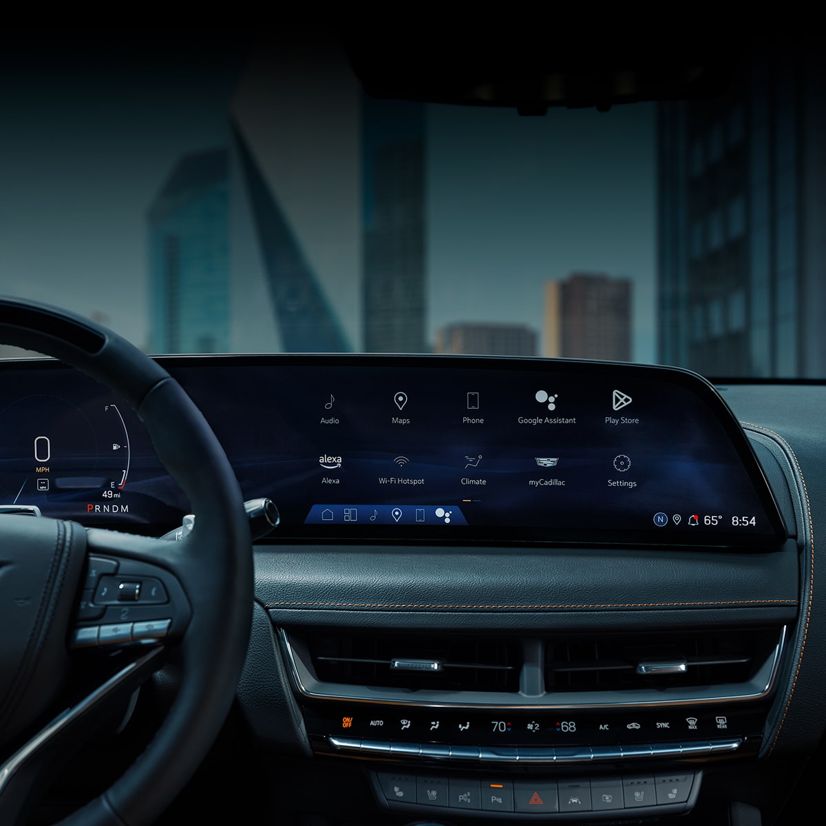 A Close-up View of a Cadillac's Display Screen and Main Controls on Dashboard