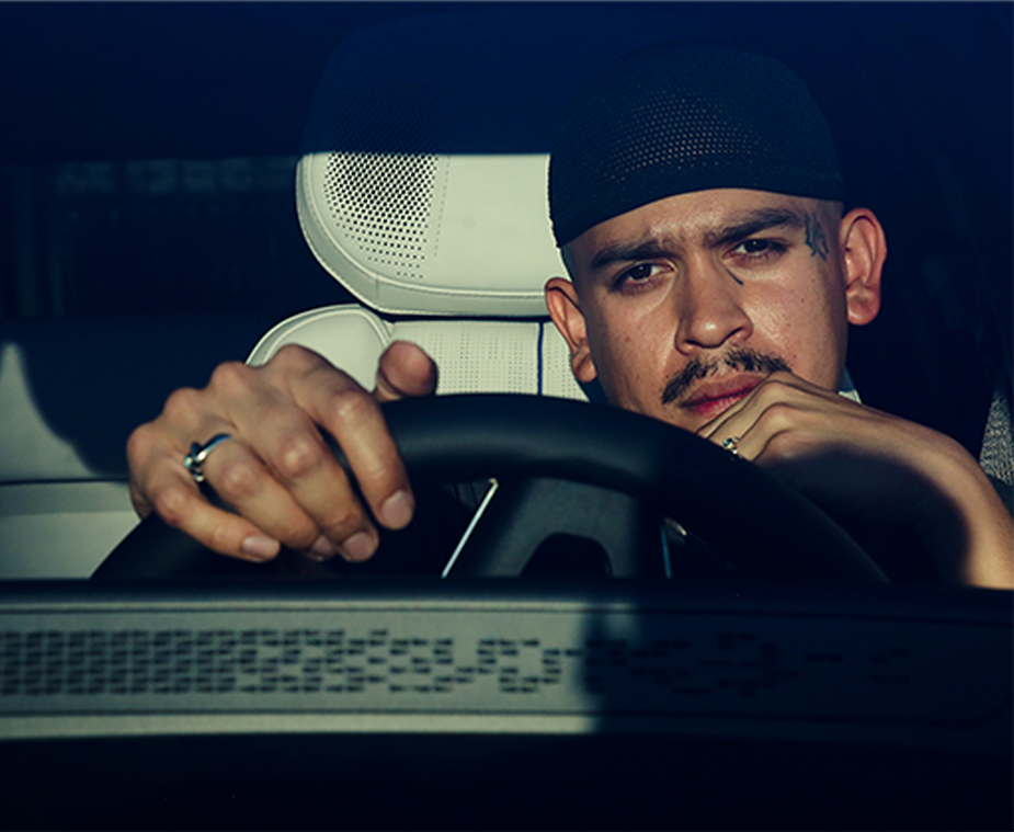 Close-up of Oakland Artist Esteban Samayoa Driving the Cadillac LYRIQ