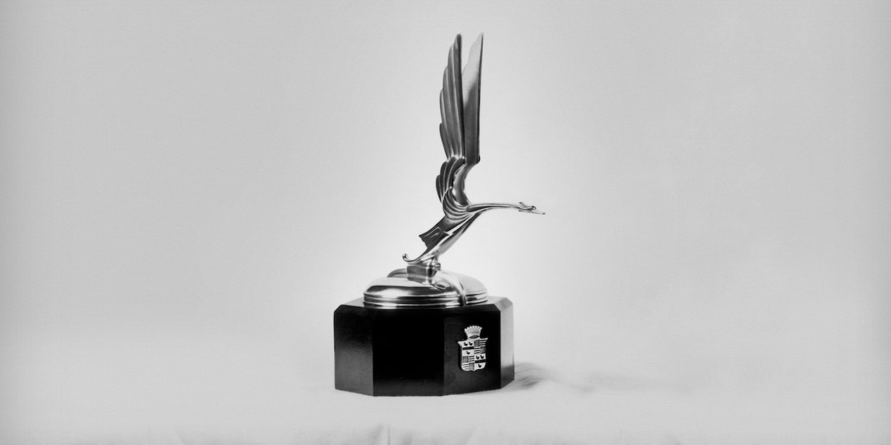 1930s Silver Cadillac Goddess Statue On Black Base