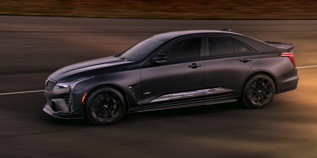 The Sebring IMSA Maverick Noir Frost Cadillac CT4 Blackwing Driving Quickly on the Track