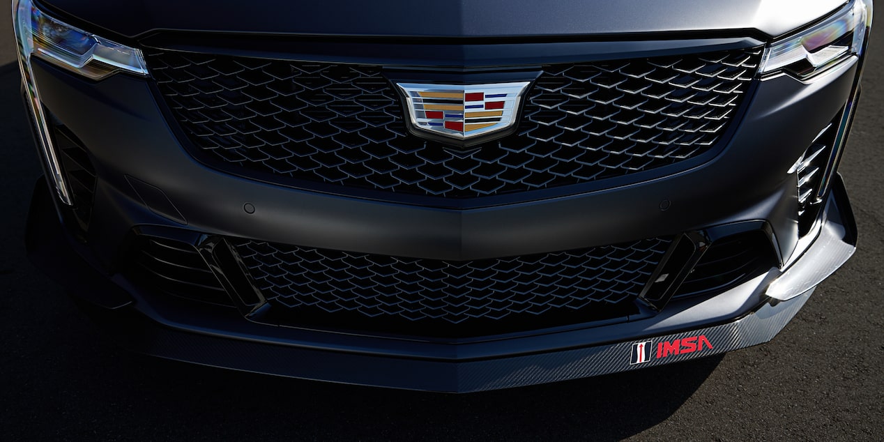 The Front Splitter IMSA Logos on The Maverick Noir Frost CT4 Blackwing