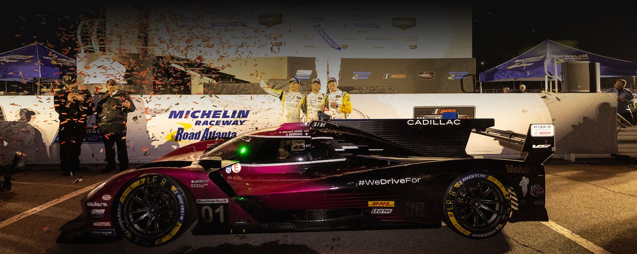 The Cadillac Racing Team Behind the Pink V-Series.R Racecar Celebrating the Petit Le Mans Victory