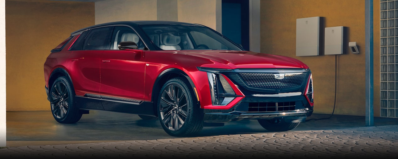 A Cadillac LYRIQ Charging in a Garage at Home