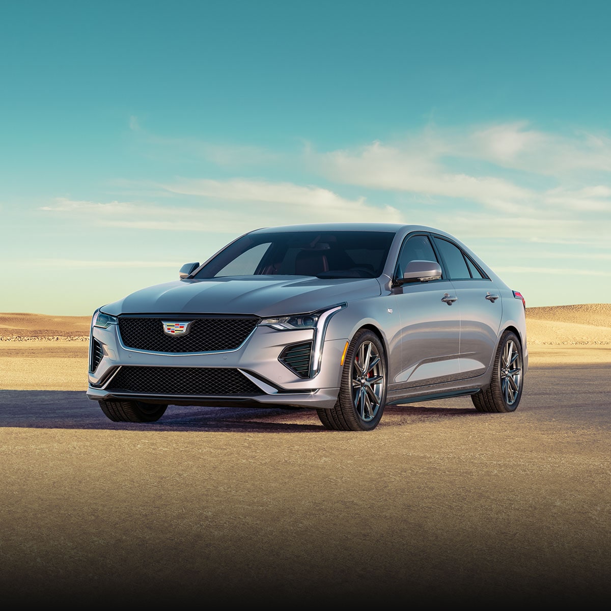 Three-quarter View of a 2025 Cadillac CT4 Parked in the Open Desert