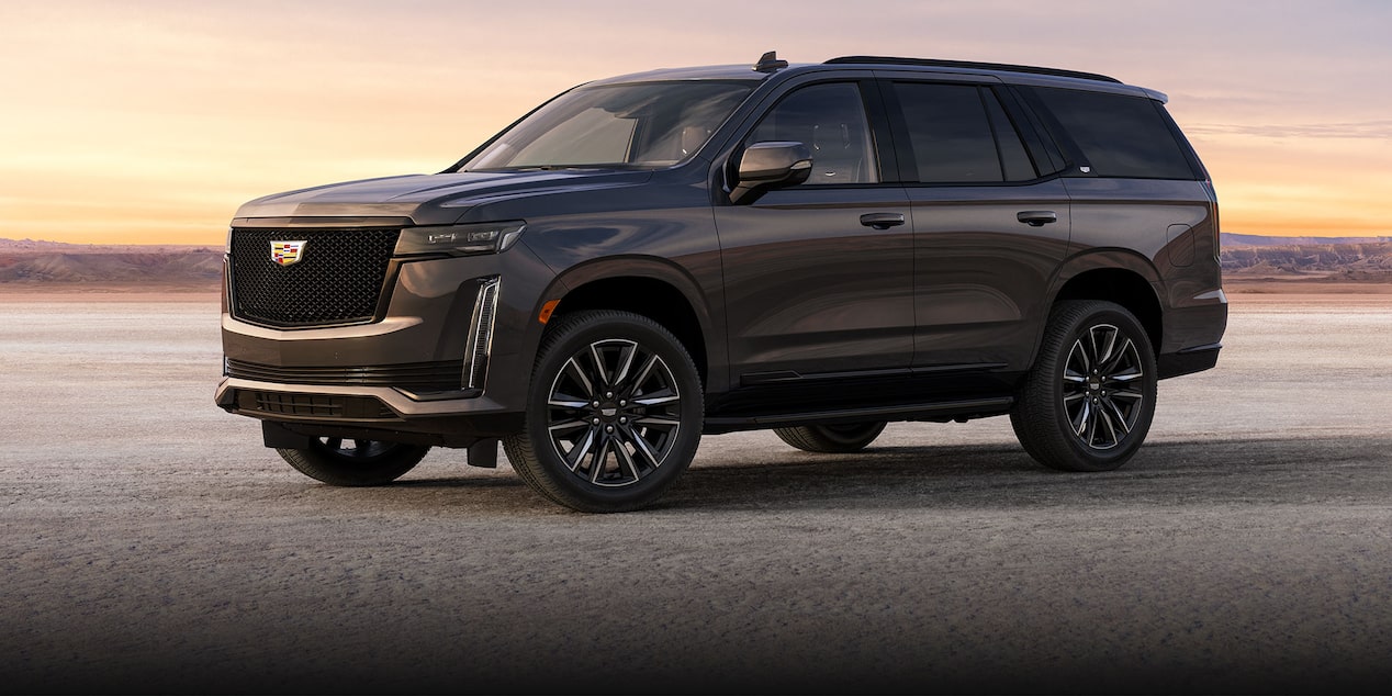 Side Profile View of a 2024 Cadillac Escalade Parked in the Desert